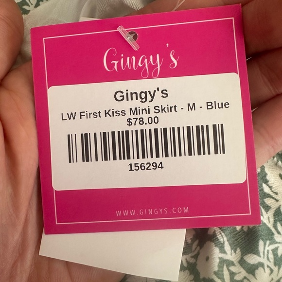 Mini skirt size medium. Green and white floral. Loose fitting and comfortable. - Picture 2 of 3